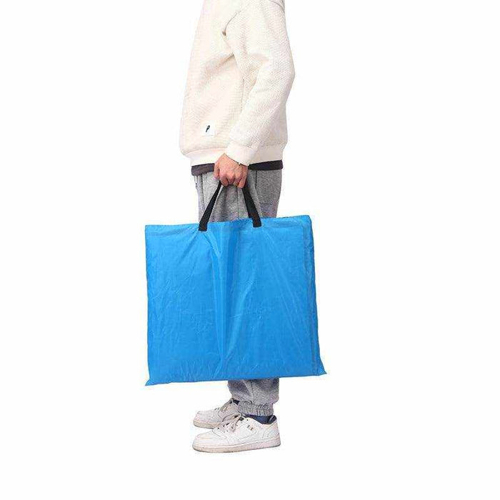 Foldable blue and orange outdoor beach mat made of durable 600D Oxford cloth with adjustable reclining positions and carrying strap