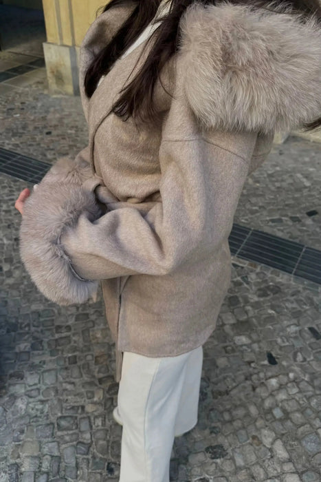 Luxurious fake fur coat with hood